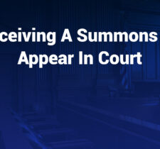 receiving a summons to appear in court