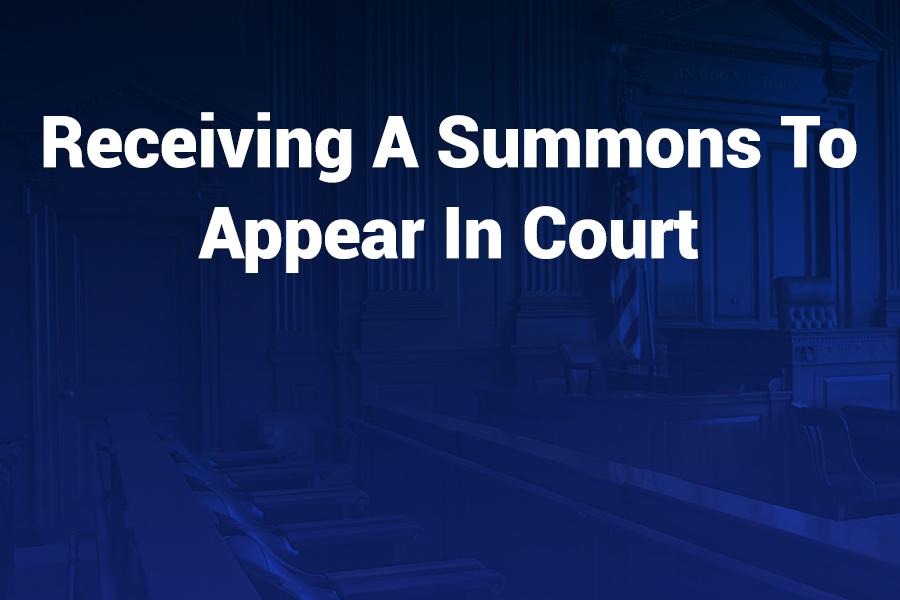 receiving a summons to appear in court